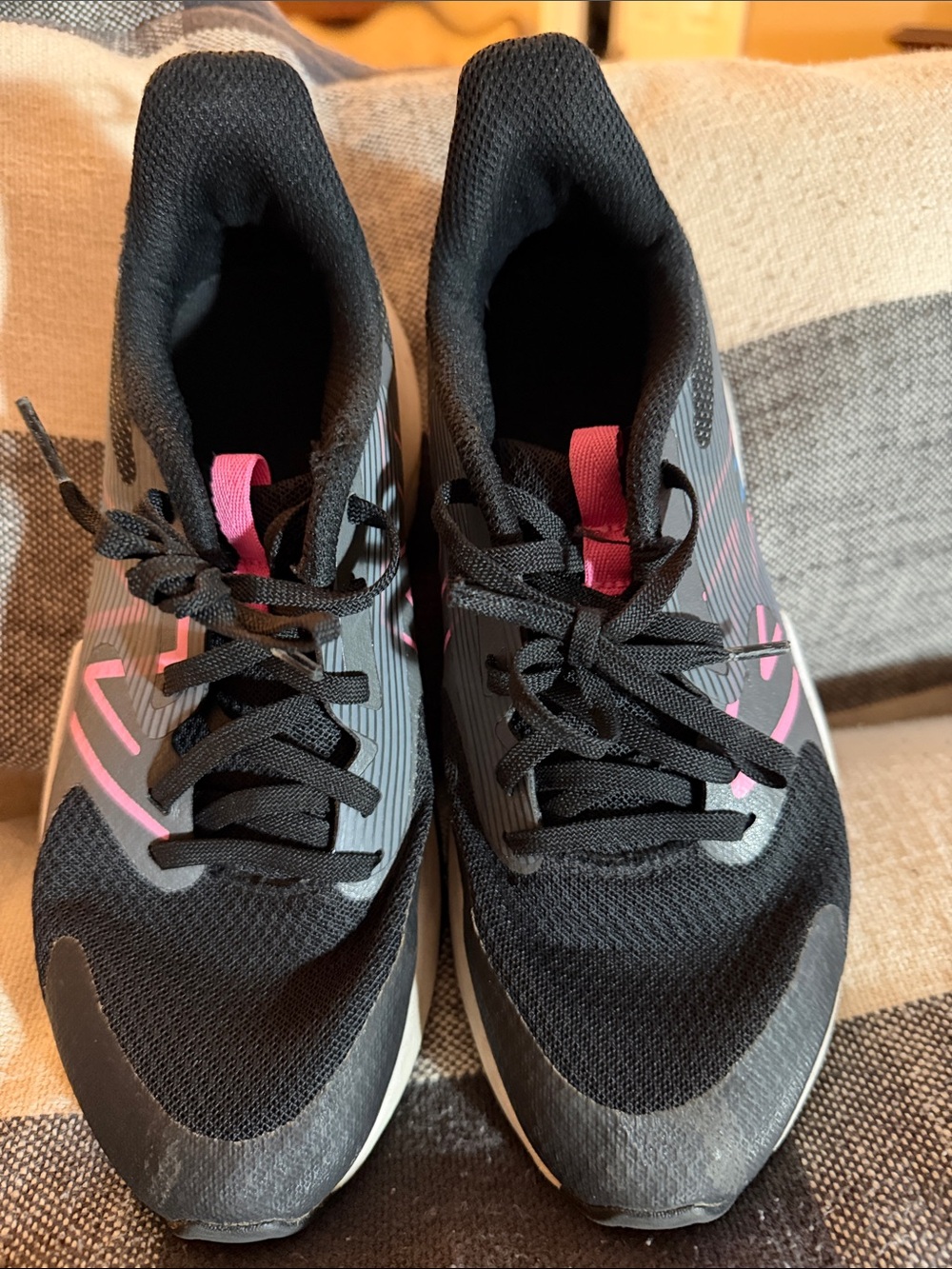 New Balance Black Sneakers with Pink Accents